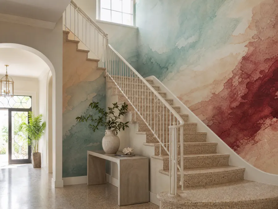 Abstract watercolour mural in aqua and sand tones on an entry hall stairwell wall